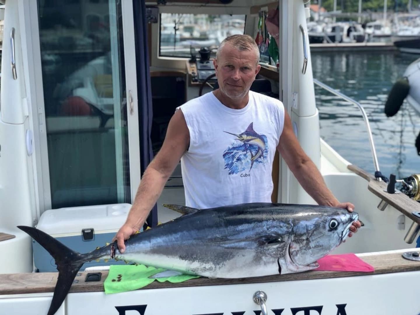 Bottom fishing and jigging in the open sea - boat photo